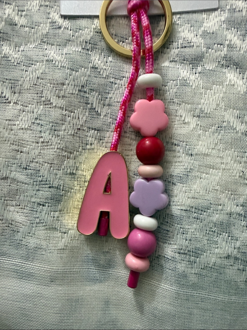 BaubleBar Pink and Red Beaded 'A' Bag Charm - Picture 2 of 3
